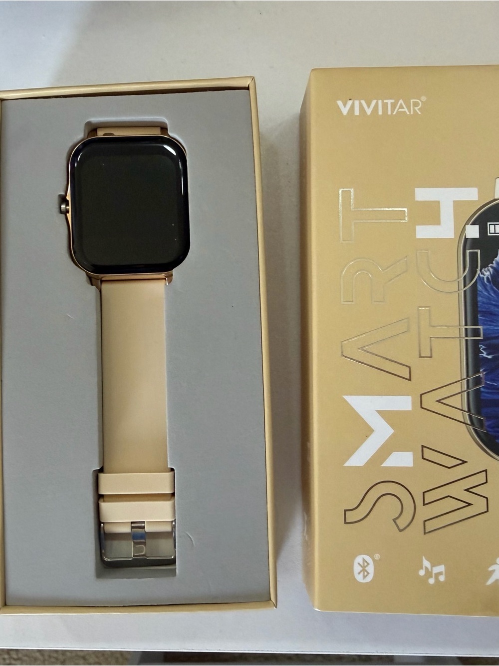 Rose Gold Smartwatch with Cream Band
